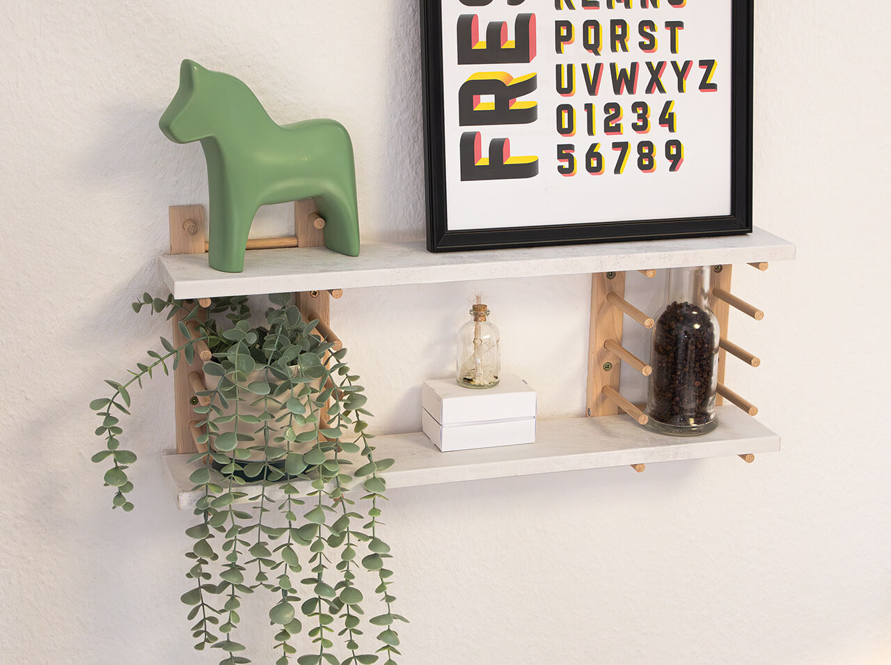 DIY shelf unit made from plate holders and shelves
