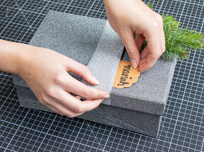 Name tag is inserted into the compartment.